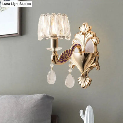 Gold Peacock Wall Sconce by Decorbites with crystal shade and ornate backplate on Tampa Home & Garden Store