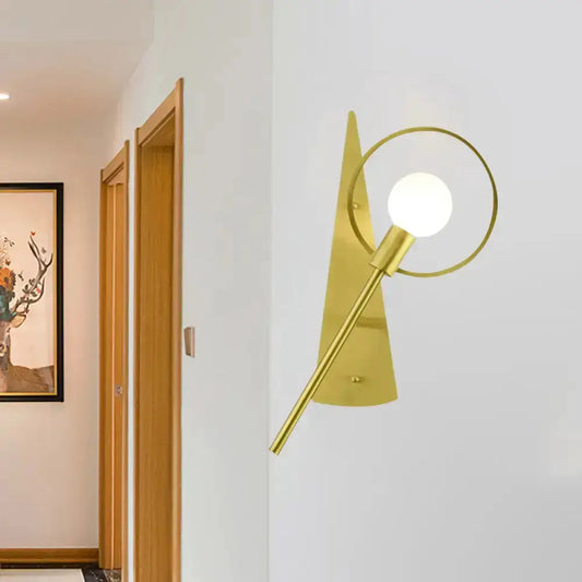 Modern gold angular ring sconce with globe bulb for bedroom decor on Tampa Home & Garden Store