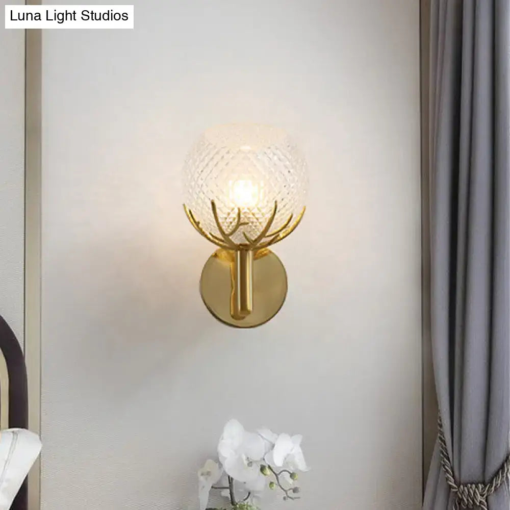 Gold lattice glass sconce with brass finish and circular wall mount on Tampa Home & Garden Store