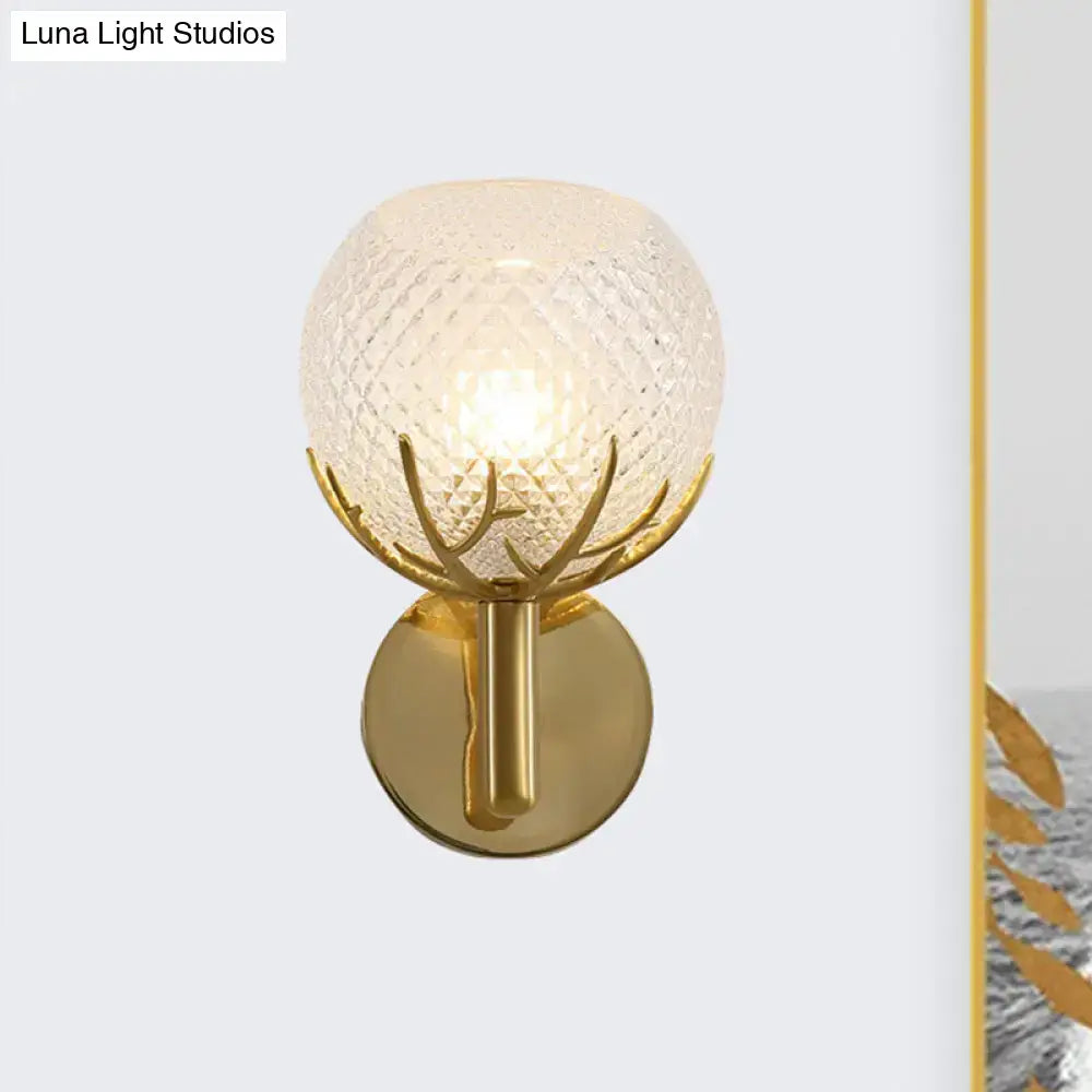 Gold lattice glass sconce with textured globe and brass mount by Decorbites; Luna Light Studios on Tampa Home & Garden Store