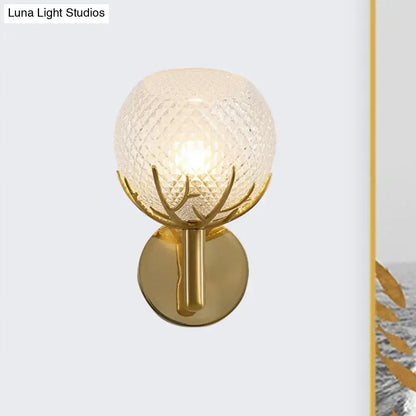 Gold lattice glass sconce with textured globe and brass mount by Decorbites; Luna Light Studios on Tampa Home & Garden Store