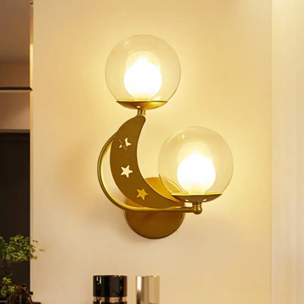 Gold Ball Wall Sconce by Decorbites with twin glass globes and crescent star accents on Tampa Home & Garden Store