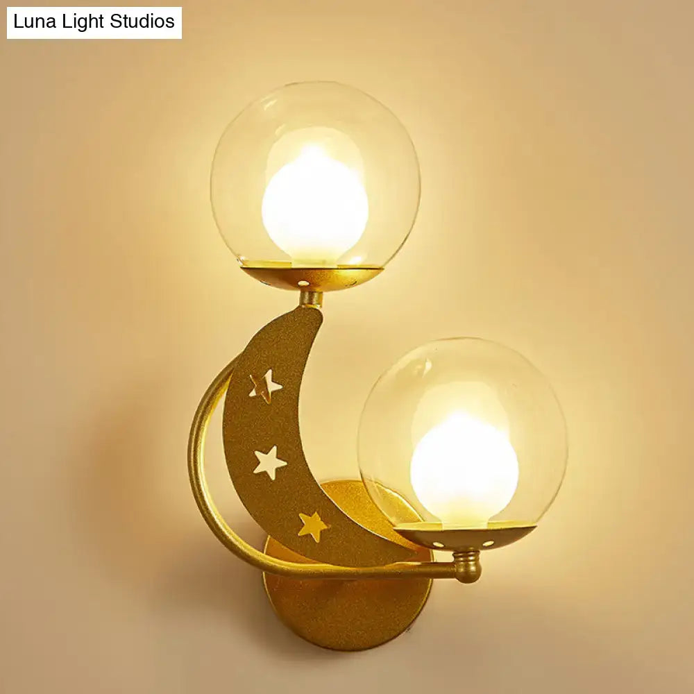 Decorbites gold ball wall sconce crescent moon cutouts and dual glass globes on gold mount on Tampa Home & Garden Store