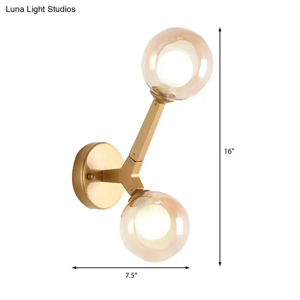 Modern gold double-globe wall lamp sconce by Decorbites with brass finish and two glass globes on Tampa Home & Garden Store