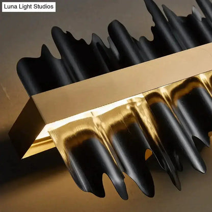 Modern gold and black iceberg LED chandelier with jagged icicle accents for dining room use on Tampa Home & Garden Store