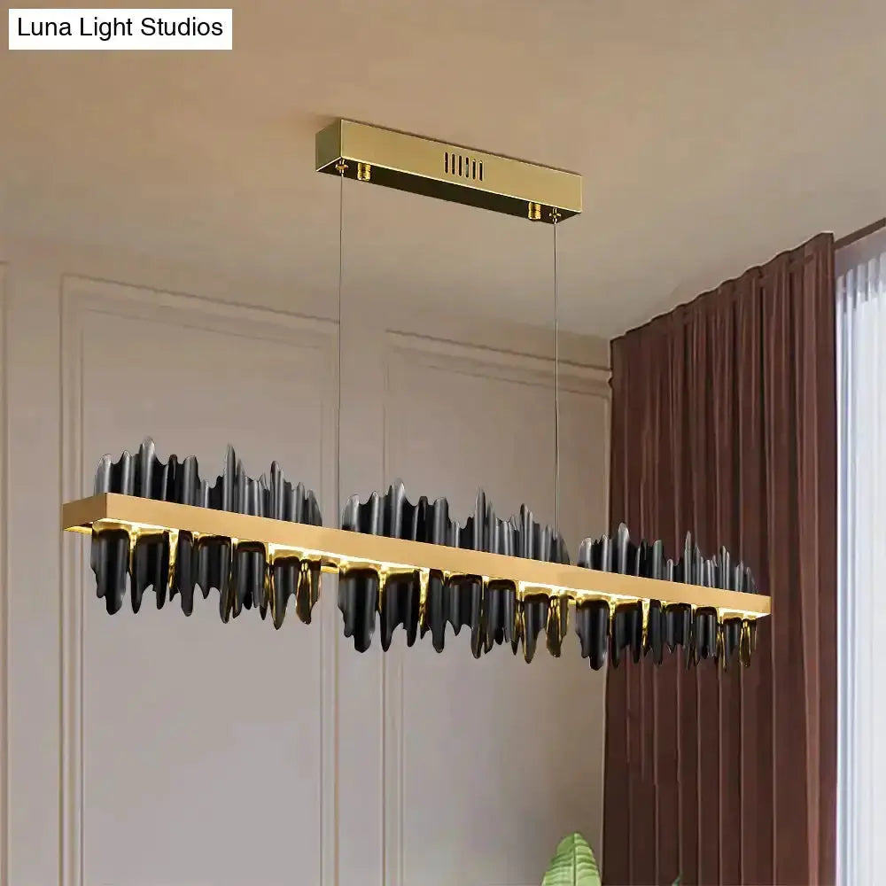 Modern iceberg LED chandelier with gold bar and black icicle accents on Tampa Home & Garden Store