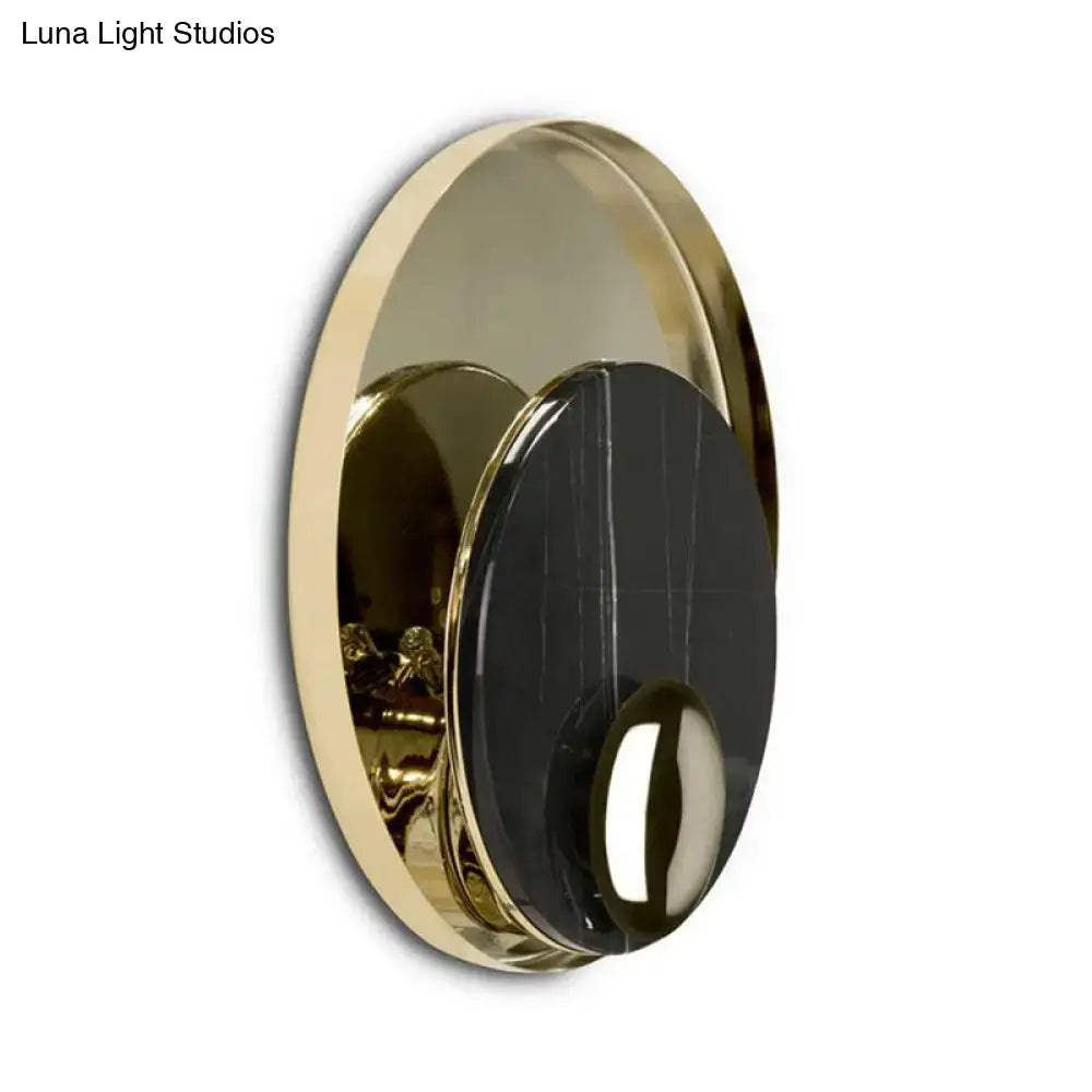 Marble Peacock Wall Sconce by Decorbites featuring gold metal ring and black marble disk on Tampa Home & Garden Store