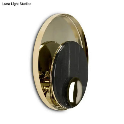 Marble Peacock Wall Sconce by Decorbites featuring gold metal ring and black marble disk on Tampa Home & Garden Store