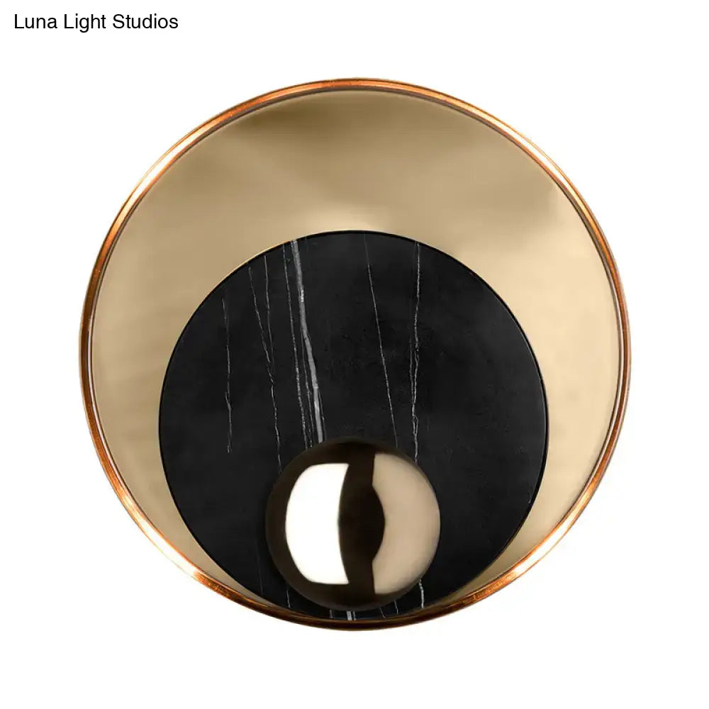 Marble Peacock Wall Sconce by Decorbites; gold rim, black marble center on Tampa Home & Garden Store