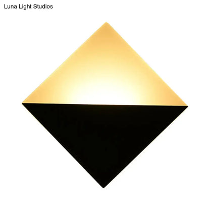 Gold black square sconce in a rotated diamond shape with gold top and black bottom on Tampa Home & Garden Store