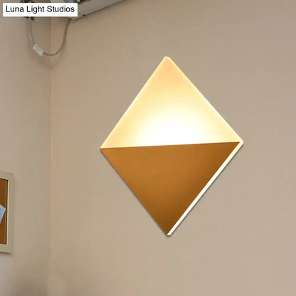 Gold black square diamond wall sconce with two-tone triangles Luna Light Studios watermark on Tampa Home & Garden Store