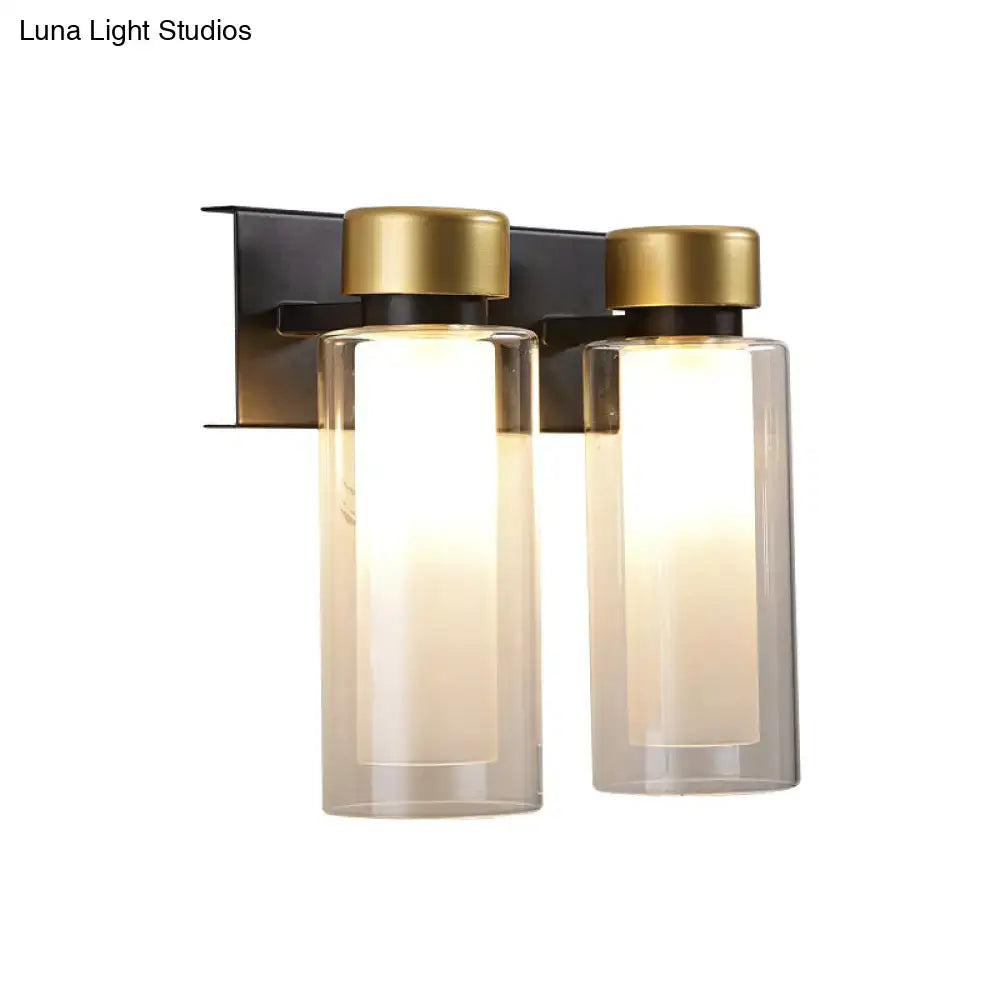 Gold Black Dual Cylinder Lamp wall sconce with clear glass shades by Decorbites on Tampa Home & Garden Store