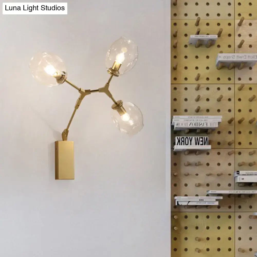 Gold branch wall sconce with brass arms and glass bulbs by Decorbites on Tampa Home & Garden Store