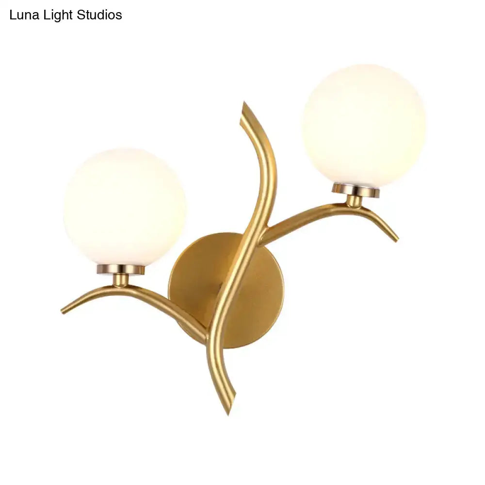 Modern gold branch wall light fixture living room sconce with two frosted globes by Decorbites on Tampa Home & Garden Store