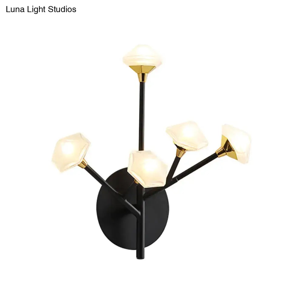 Gold branching wall sconce with black metal stem and frosted glass lamps by Decorbites on Tampa Home & Garden Store