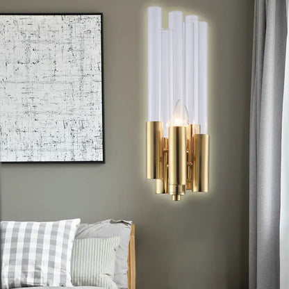 Gold brass candelabra sconce with white flute shade tubes and central bulb by Decorbites on Tampa Home & Garden Store