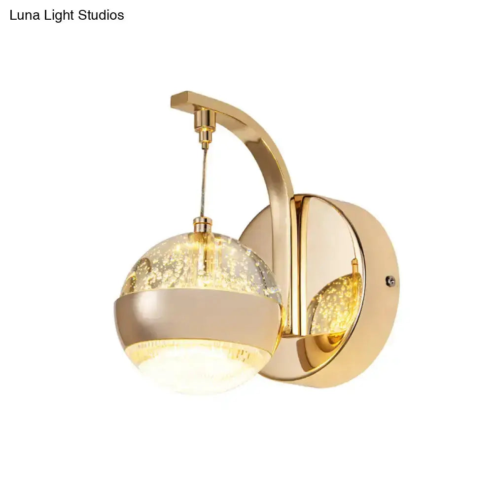 Modern gold and chrome crystal ball wall light by Decorbites with glass orb and curved arm on Tampa Home & Garden Store