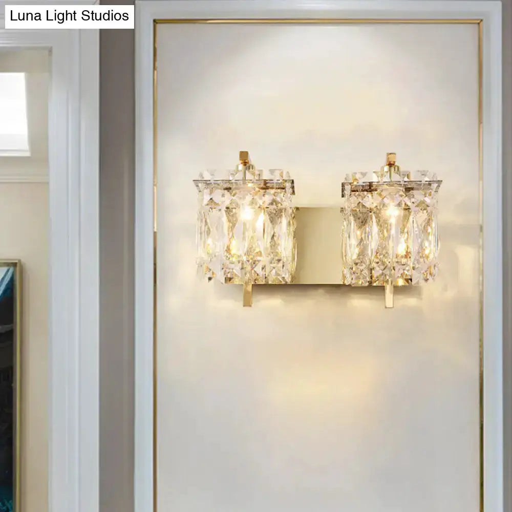 Modern gold and chrome crystal wall light fixture with dual crystal prisms Decorbites on Tampa Home & Garden Store