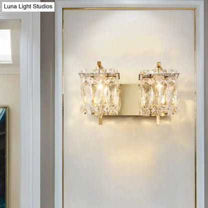 Modern gold and chrome crystal wall light fixture with dual crystal prisms Decorbites on Tampa Home & Garden Store