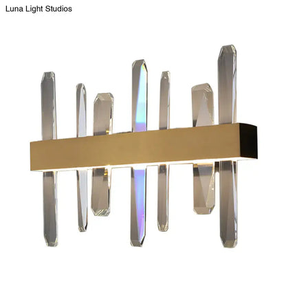 Gold crystal bar sconce with clear prism rods and rectangular gold base on Tampa Home & Garden Store