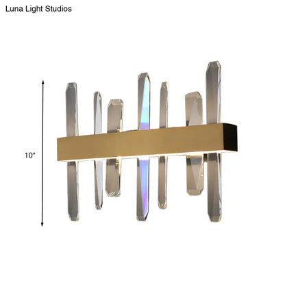 Gold crystal bar wall sconce with clear prism rods and a brushed gold bar on Tampa Home & Garden Store