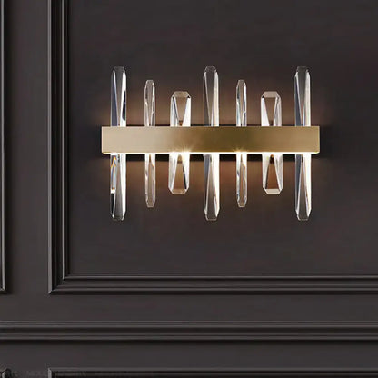 Gold Crystal Bar Sconce by Decorbites, brass-toned bar with clear crystal prisms on Tampa Home & Garden Store