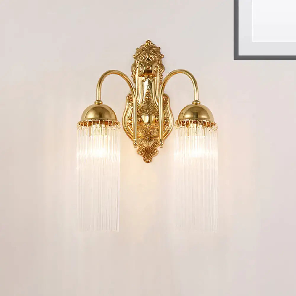 Gold crystal gooseneck double-sconce with ornate backplate and crystal fringe by Decorbites on Tampa Home & Garden Store