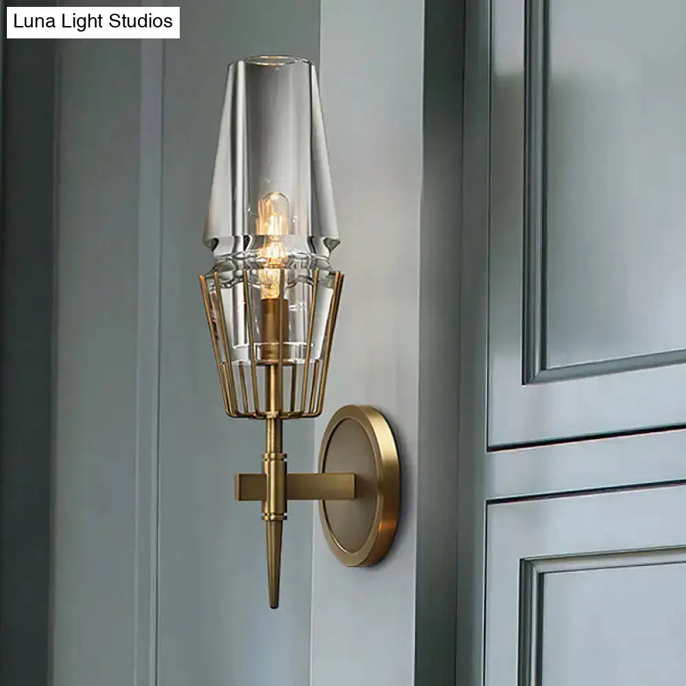 Modern gold clear glass wall lamp sconce for bedroom with geometric brass cage by Decorbites on Tampa Home & Garden Store