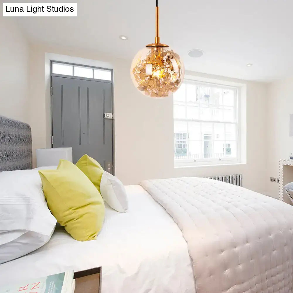 Gold glass orb wall light pendant by Decorbites with gold finish in a bright bedroom on Tampa Home & Garden Store