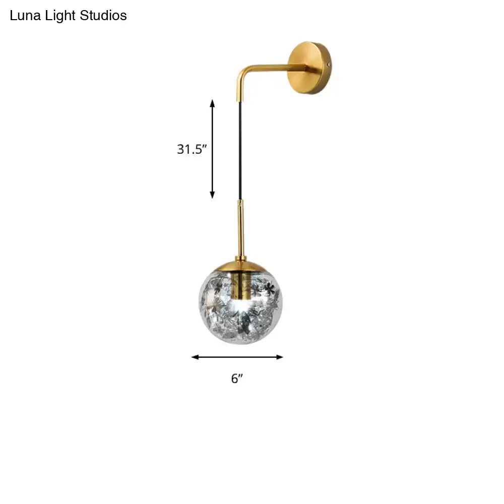 Decorbites Gold Glass Orb Wall Light with brass finish and clear orb, 31.5 in length on Tampa Home & Garden Store