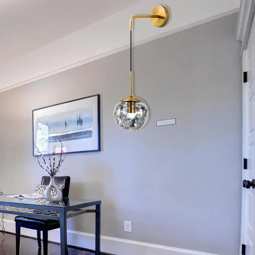 Gold Glass Orb Wall Light Decorbites, brass arm with clear etched glass globe and black cord on Tampa Home & Garden Store