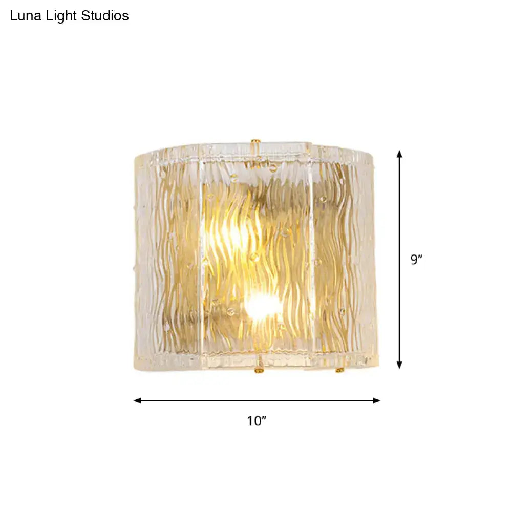 Gold Ripple Glass Sconce by Decorbites, clear ribbed glass shade with warm gold glow, 9in x 10in on Tampa Home & Garden Store