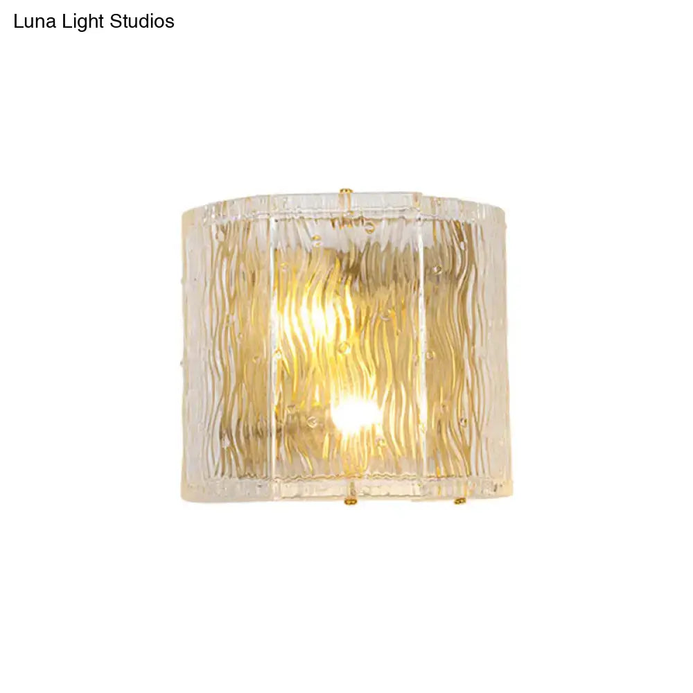 Gold Ripple Glass Sconce by Decorbites, textured clear glass wall light with warm gold glow on Tampa Home & Garden Store