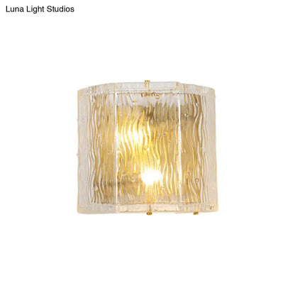 Gold Ripple Glass Sconce by Decorbites, textured clear glass wall light with warm gold glow on Tampa Home & Garden Store