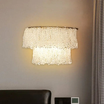Gold crystal two-layer bead wall sconce by Decorbites with warm glow on Tampa Home & Garden Store