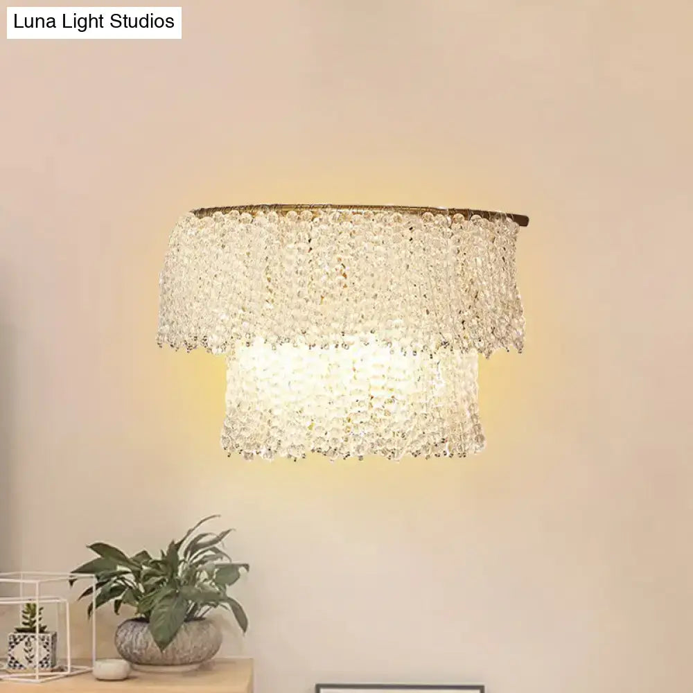 Gold Crystal Two-Layer Bead Wall Sconce by Decorbites, gold metal frame with crystal bead tiers on Tampa Home & Garden Store