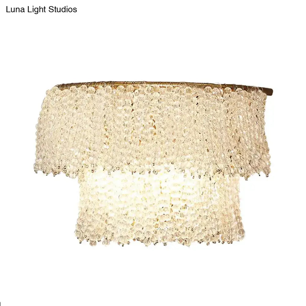 Gold crystal two-layer bead wall sconce by Decorbites on Tampa Home & Garden Store