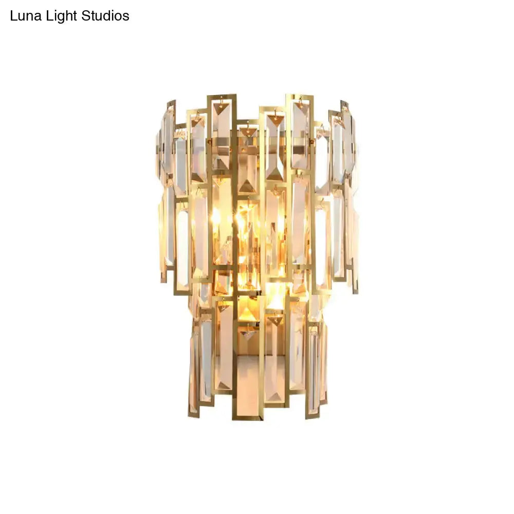 Modern gold crystal block wall sconce with stacked rectangular prisms, warm light on Tampa Home & Garden Store