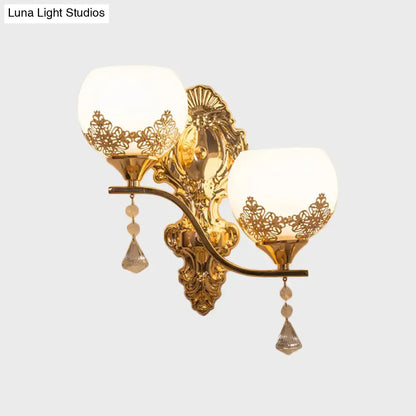 Gold crystal bowl lace cutout dual-arm sconce with frosted glass shades and hanging crystals on Tampa Home & Garden Store