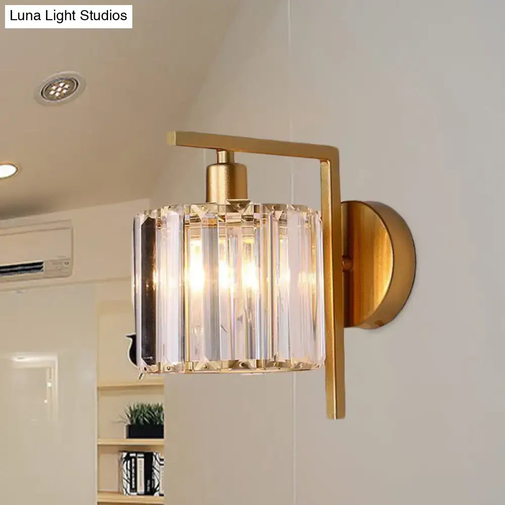 Gold crystal column wall sconce with brass finish and crystal prisms on Tampa Home & Garden Store