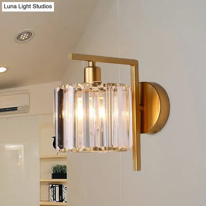Gold crystal column wall sconce with brass finish and crystal prisms on Tampa Home & Garden Store