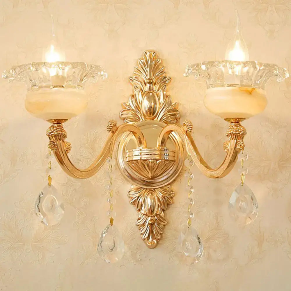 Decorbites gold crystal droplet dual-arm wall sconce with crystal drops on Tampa Home & Garden Store