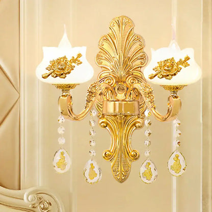 Modern gold crystal droplet wall sconce by Decorbites, with dual arms and backplate on Tampa Home & Garden Store