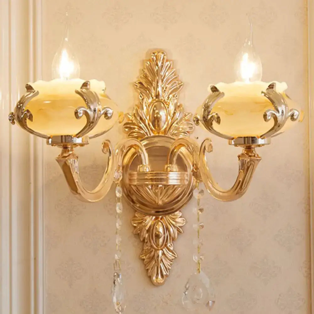Modern gold crystal droplet two-light wall sconce by Decorbites with ornate backplate on Tampa Home & Garden Store