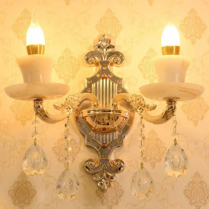 Decorbites modern gold crystal droplet wall sconce with two candle bulbs and crystal drops on Tampa Home & Garden Store