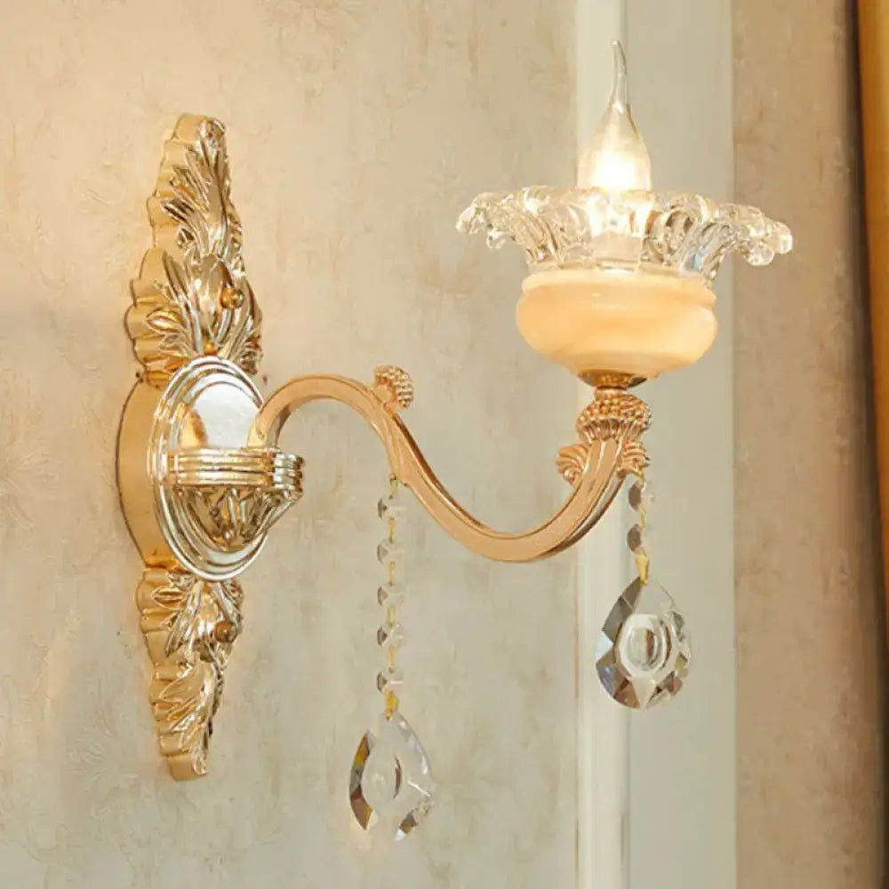 Modern gold crystal droplet wall sconce with ornate backplate and hanging prisms on Tampa Home & Garden Store