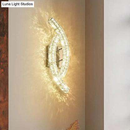 Gold crystal leaf sconce by Decorbites, wall-mounted curved double-arc with crystals, warm light on Tampa Home & Garden Store