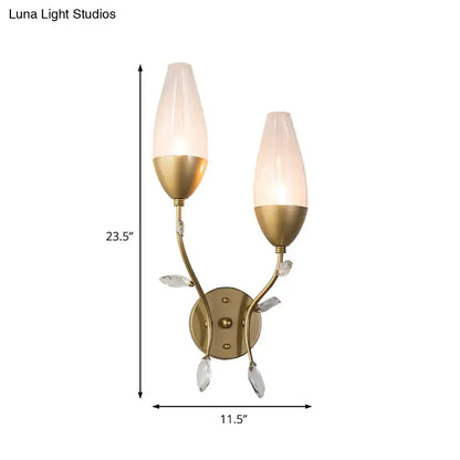 Decorbites gold sconce with 1-2 lights, curved arms, leaf glass shades, brass finish on Tampa Home & Garden Store