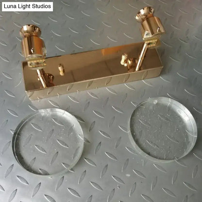 Gold three-globe wall light with brass finish and backplate, two lamp holders at ends on Tampa Home & Garden Store