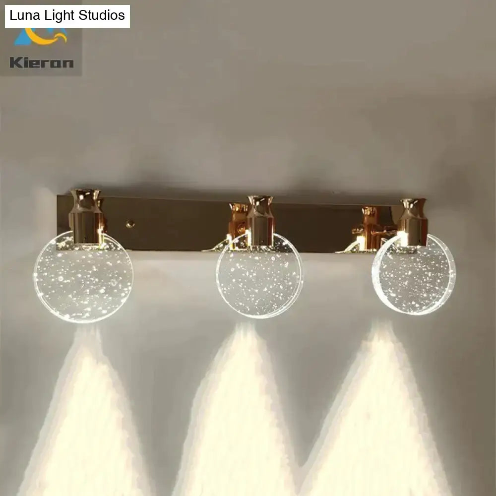 Gold three globe wall light Decorbites with glass bubble spheres on Tampa Home & Garden Store